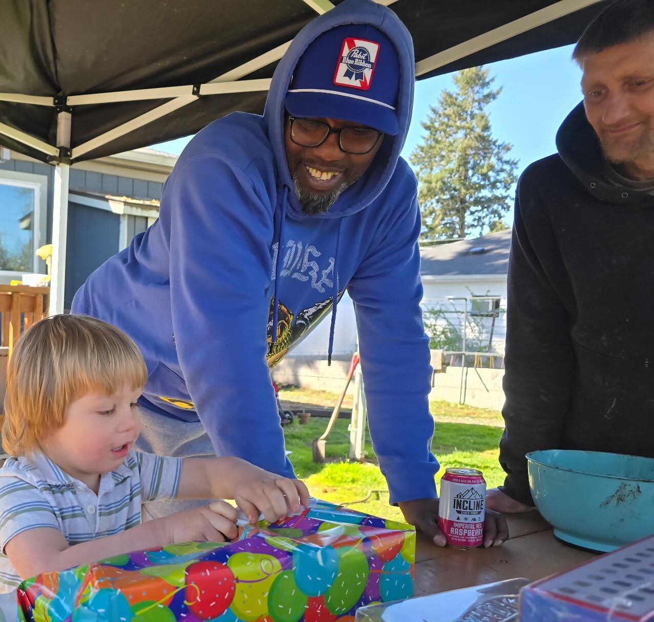 Joshawa, right, at Julie's grandson's four year old birthday party