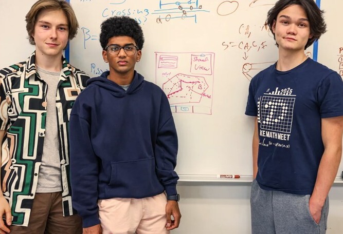 Three high school boys who created a map of a safer route to school for young children